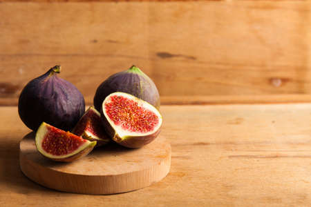Fresh fig on wood desk.の写真素材