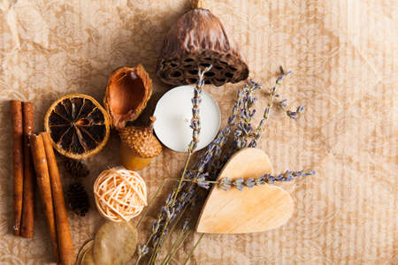 Composition with dry lotus on wood desk