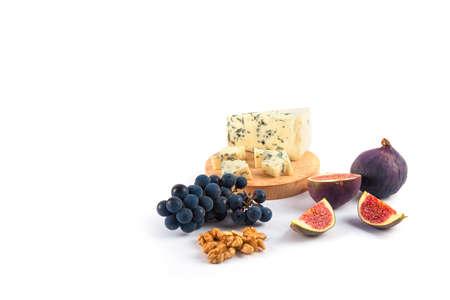 Blue cheese with grape close up.の写真素材