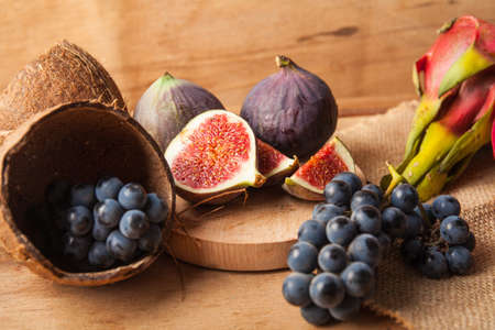 Fresh fruits on wood desk.の写真素材