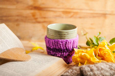 Autumn composition with cup coffee and yellow leaf.の写真素材