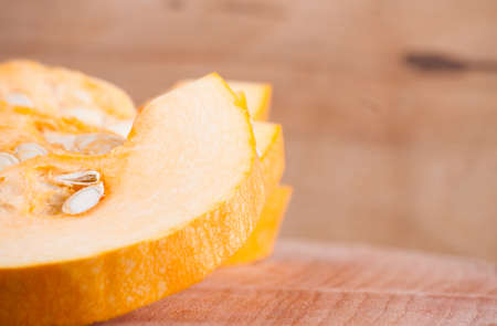 Ripe yellow pumpkin close up. Food ingredientsの写真素材