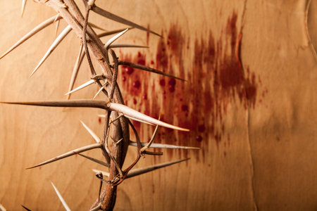 Crown of thorns with blood on wood desk. Christian conceptの写真素材