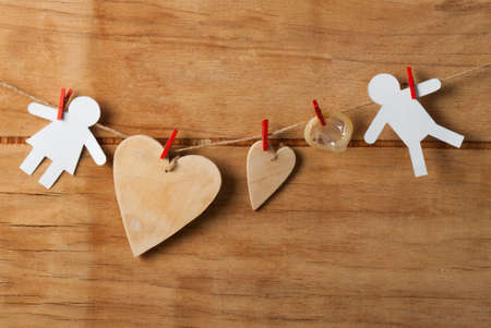 Thumb and condom over  on wood desk. World AIDS Dayの写真素材