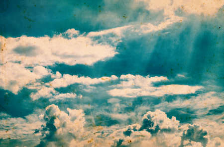 Blue sky with white clouds. Retro background