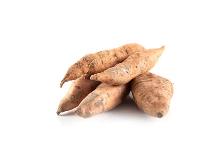 raw sweet potato isolated on white backgroundの写真素材