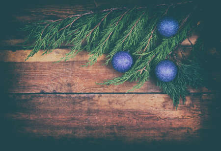 Christmas background with blue ball. Present gift on wood deskの写真素材