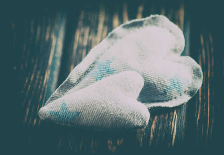 Heart from cloth on wood desk. Happy Valentine's Dayの写真素材