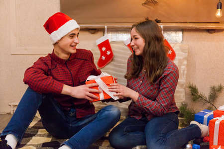 Boyfriend and girlfriend celebrate the new year. Merry Christmasの写真素材