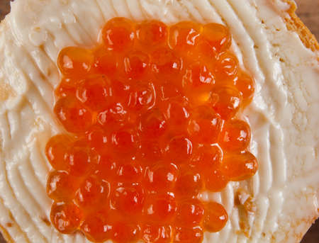Butter with red caviar close up. Food ingredientsの写真素材