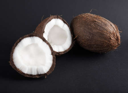 Ripe coconut close up on wood desk. Food ingredientsの写真素材