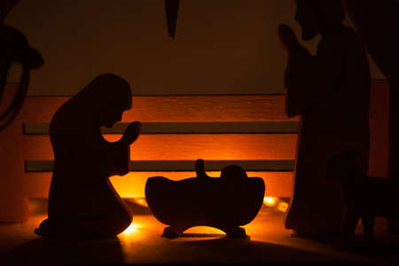 Christmas nativity scene of baby Jesus in the manger with Joseph, Mary and shepherdsの写真素材