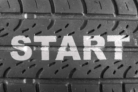 Inscription START on car tire close up. Business conceptionの写真素材