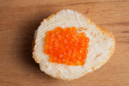 Butter with red caviar close up. Food ingredientsの写真素材