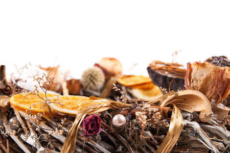 decorative wreath from a vine with dry plantsの写真素材