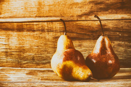 Ripe fresh pear on wood desk. Fresh fruitsの写真素材