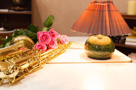 Saxophone with roses close up. Mothers day. Greeting cardの写真素材