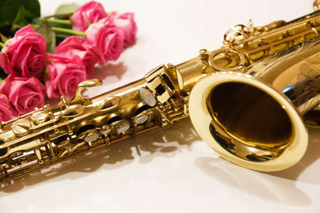Saxophone with roses close up. Mothers day. Greeting cardの写真素材