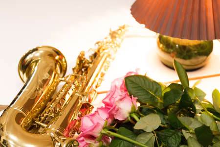Saxophone with roses close up. Mothers day. Greeting cardの写真素材