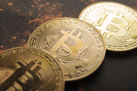 Gold bitcoin on black background. Crypto-currency conceptの写真素材