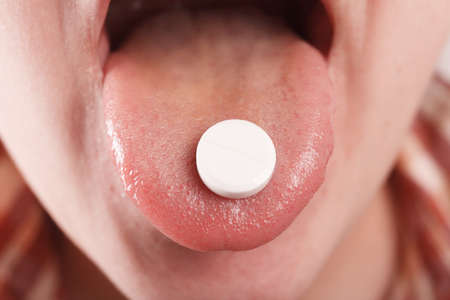 Pills in hand close up. Medicine conceptの写真素材