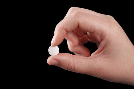 Pills in hand close up. Medicine conceptの写真素材