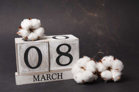 Women's day March 8 with wooden block calendar. Happy mother's day. Spring flower