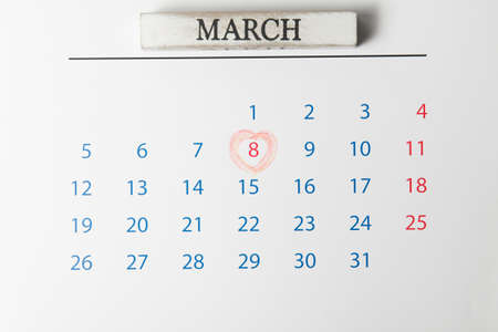 Calendar with a red circle around the number 8. Happy woman's dayの写真素材