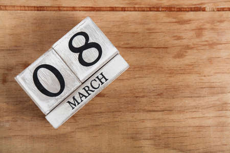 Women's day March 8 with wooden block calendar. Happy mother's day. Spring flowerの写真素材