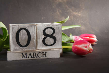 Women's day March 8 with wooden block calendar. Happy mother's day. Spring flowerの写真素材