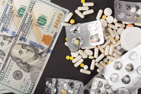 Pills close up on black background. Medical conceptの写真素材