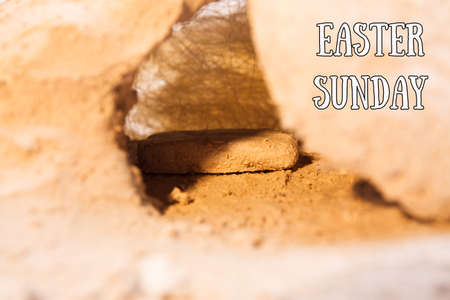 The stone is rolled away from the grave on Easter morning. Jesus risenの写真素材