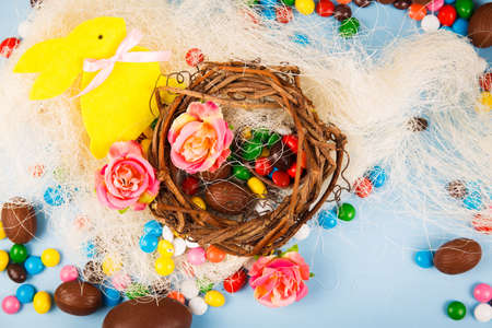 Chocolate eggs and color candy glaze. Background for Easter Day