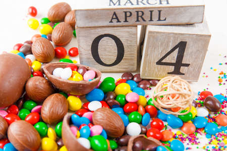 Chocolate eggs and color candy glaze. Background for Easter Day