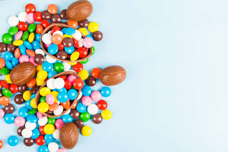 Chocolate eggs and color candy glaze. Background for Easter Dayの写真素材