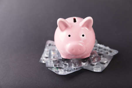 Tablets and capsules are scattered on the table. Healthcare conceptの写真素材