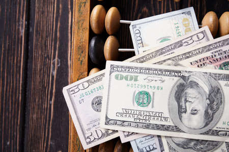 Vintage abacus on wooden background. Business conceptの写真素材