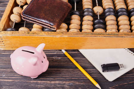 Vintage abacus on wooden background. Business conceptの写真素材