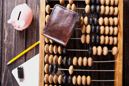 Vintage abacus on wooden background. Business conceptの写真素材