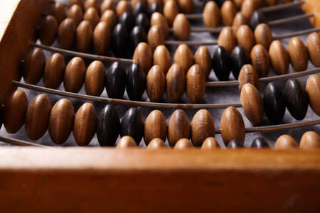 Vintage abacus on wooden background. Business conceptの写真素材