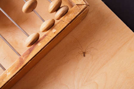 Vintage abacus on wooden background. Business conceptの写真素材