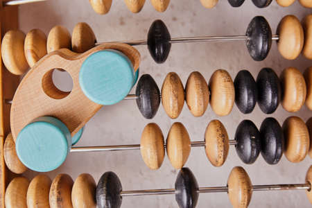 Vintage abacus on wooden background. Business conceptの写真素材