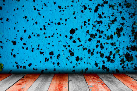 Old grunge wall with wood flour. Empty room. Stage backgroundの写真素材