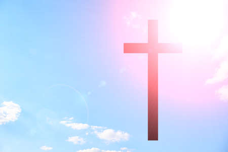 Cross on blue sky. Religion concept. Jesus love youの写真素材