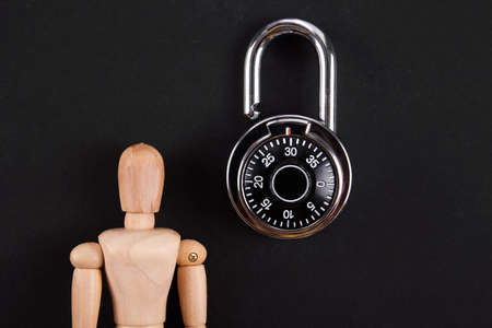 combination lock close up on black background. safe concept.の写真素材