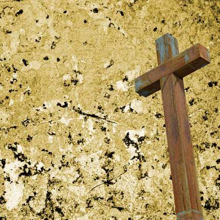 Old wood cross on wall background. Retro textureの写真素材