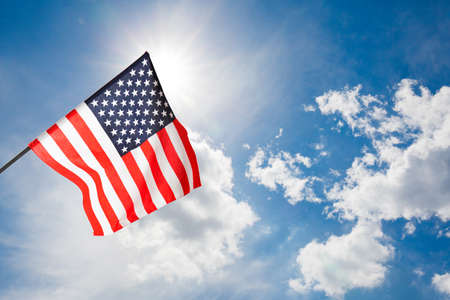 American flag on blue sky outdoor. Nature backgroundの写真素材