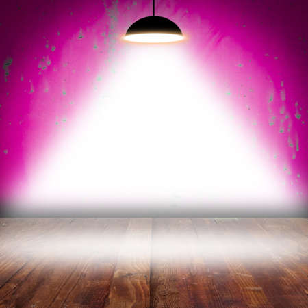 White poster on wall with lamp with place for textの写真素材