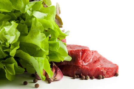 Raw fresh meat isolated on white backgroundの写真素材