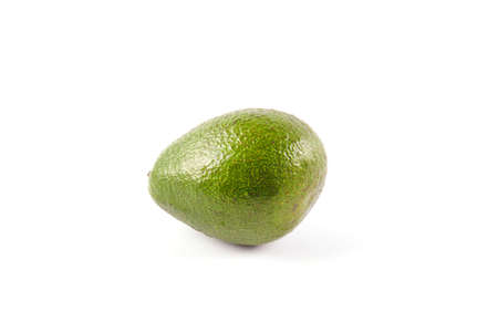 Green fresh ripe avocado isolated on white background